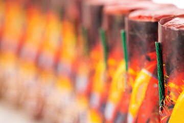 Many firecrackers flying fireworks, close-up, macro. Safety precautions for pyrotechnic explosions. Fireworks Explosion Safety