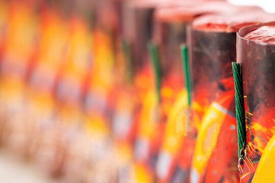 Many firecrackers flying fireworks, close-up, macro. Safety precautions for pyrotechnic explosions. Fireworks Explosion Safety