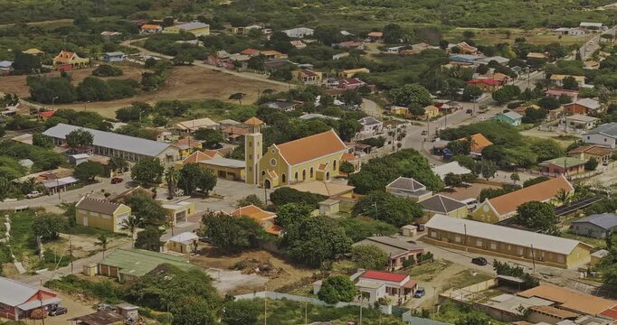 Bonaire Caribbean Netherlands Aerial v81 zoomed flyover residential area capturing the St. Ludovicus Bertrandus Church and the surrounding townscape - Shot with Mavic 3 Pro Cine - Feb 3rd 2024