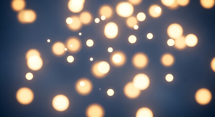 Soft golden bokeh lights on a dark blue background