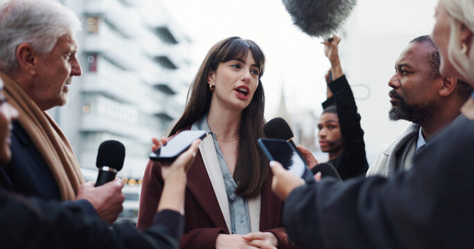Woman, spokesperson and talking to press, city and journalists with election questions or discussion. Government, representative and outdoor with reporters for campaign updates and people with mic