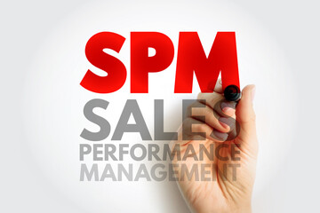 SPM SALES PERFORMANCE MANAGEMENT text with hand writing abbreviation SPM, business and corporate improvement idea representing leadership, productivity, and success management concept