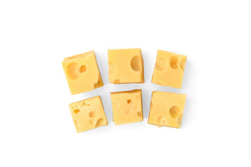 Maasdam cheese cubes isolated on white background.