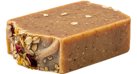 Close up of a bar of handmade soap with oats and flower petals on a black background studio shot