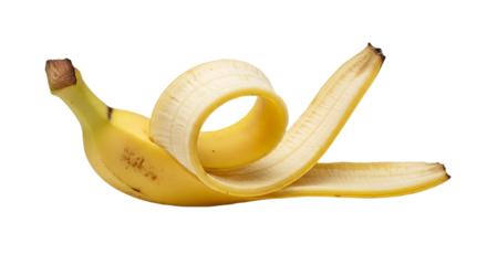 A partially peeled banana with a curled peel laying on a black surface in a studio shot close up view