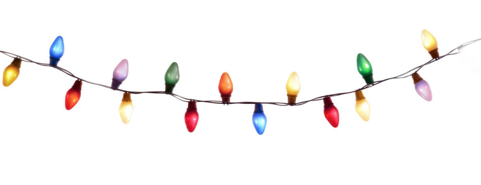 A festive string of classic colorful Christmas lights with red, blue, and green bulbs isolated on a white background for holiday decoration.