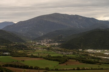 Panoramic view of Boltana surrounded by the mountains of the Aragonese Pyrenees