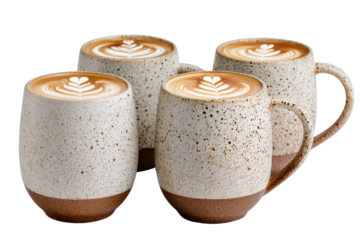 Four speckled ceramic mugs filled with latte art coffee against black image, Isolated On Transparent Background, Png Cut Out