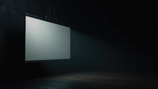 A projector screen suspended from the ceiling in a darkened room
