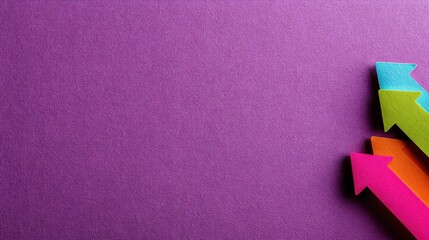 Paper cut-out arrow pointing upward on bold colored background for a playful business concept