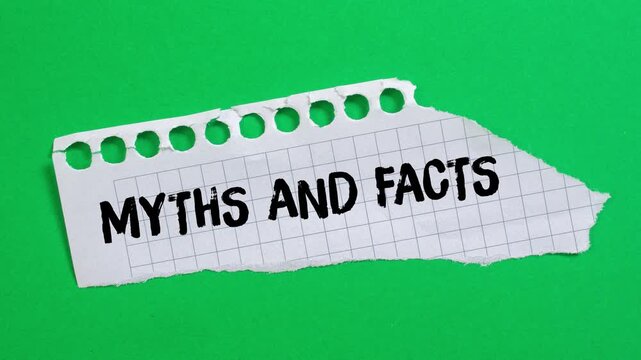 Myths and facts message writing on ripped torn paper background