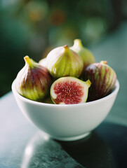 White bowl with figs in minimalist kitchen setting