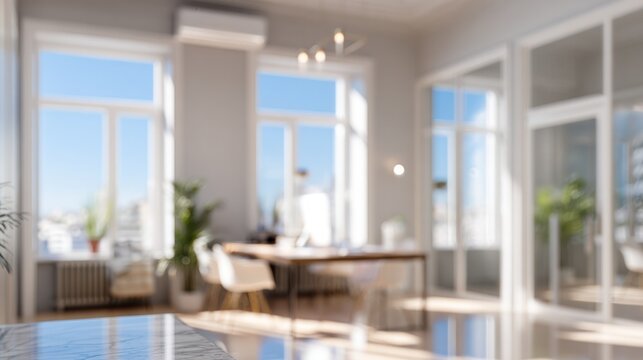 Office Space Design: A spacious and well-lit office interior, featuring large windows that flood the room with natural light and a modern aesthetic.