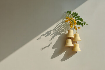 beautifully crafted arrangement of bells adorned with natural elements evoking sense of harmony and joy