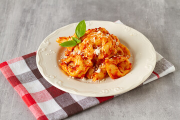 Ravioli with tomato sauce and parmesan cheese	