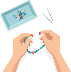 Hands stringing colorful beads to create jewelry, with a tray of beads and tools nearby