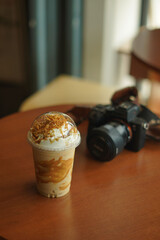 biscoff frape latte on the wood table