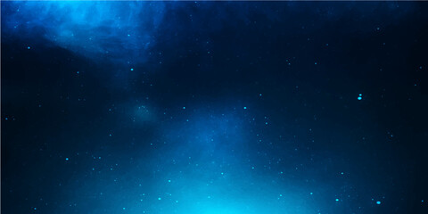 Bright blue abstract nebula light fills the dark night sky, illustrating the deep cosmos of our galaxy with starry science backgrounds