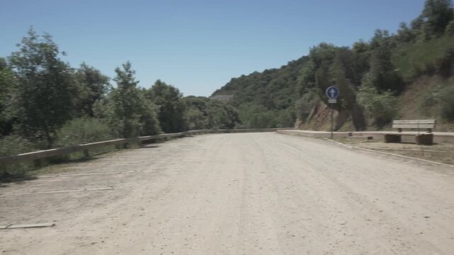 Coll Estenalles dirt road Sant Llorenc forest mountain trees pan
