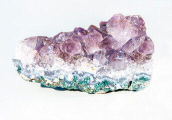 Natural mineral amethyst on white backgraund. Semi-precious multi-colored stones, minerals...