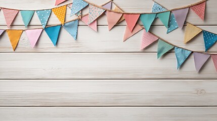Colorful bunting garlands on wooden background.