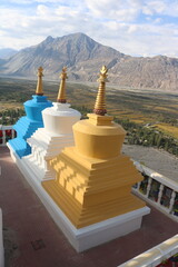 Beautiful view of Buddhist stupas, mountains and landscapes of Ladakh, India.