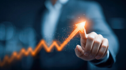 Business person in suit pointing at glowing upward arrow symbolizing growth and success in digital financial chart with futuristic background