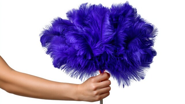 A female hand holding a vibrant purple feather duster against a pure white background, symbolizing cleanliness and domestic tasks