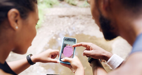 Hands, people and phone screen with personal trainer, outdoor and point for exercise program on ui. Coach, client and smartphone with scroll, info and guide on mobile app for fitness at nature park