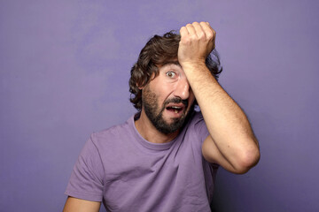 young adult expressive  bearded man