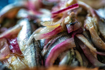 Alici in saor, marinated anchovies with red onions.