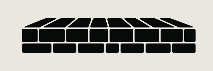 Illustration of a stacked rectangular block structure with trapezoidal top pieces in black and white