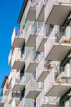 Layered architecture with angular housing volumes defining an urban cluster of contemporary style in sweden, stockholm, stora ursvik emphasizing residential facade contrast