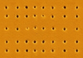 Detailed macro photograph capturing a seamless textured wallpaper pattern that mimics the appearance of toasted baked snack crackers or biscuits ,rustic ,texture ,surface