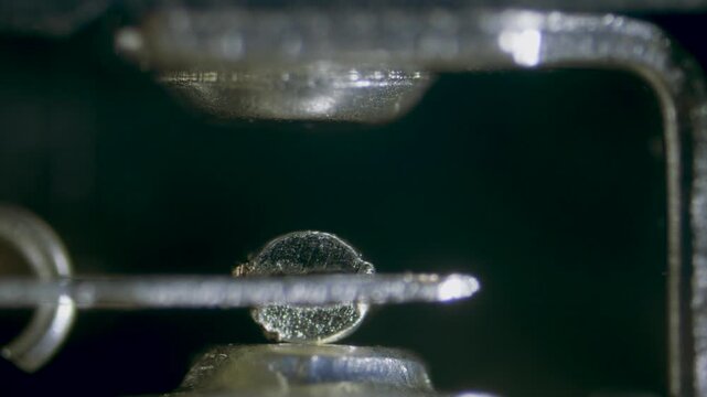Endstop limit switch internal view in action under microscope