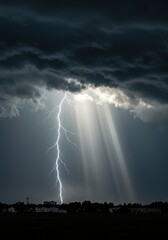 Dramatic weather scene with intense rain falling from dark, stormy clouds, illuminated by a distant flash of natural light. A powerful atmospheric event ,weather ,dramatic ,dynamic