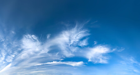 Beautiful blue sky background with cumulus clouds. Large and small vapor structures are arranged in...