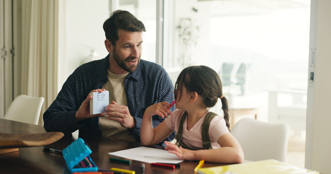 Homework, father and study with child in home for learning, education and tutor help. Student, alphabet card and knowledge support with girl and man in family house for project and solution together