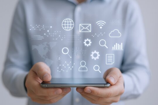 Mobile Technology Connecting the World: Man Holding Smartphone Displaying Network Icons and Digital Connectivity - Powered by Adobe