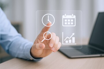 Business professional using a digital interface with calendar, clock, search and graph icons symbolizing planning and organization