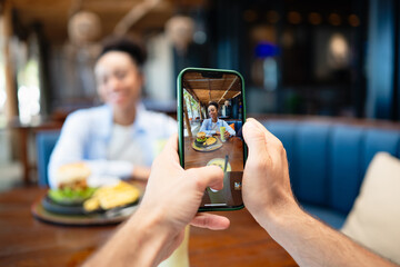 A diverse couple creates social proof as content drives reviews, bookings, loyalty and growth