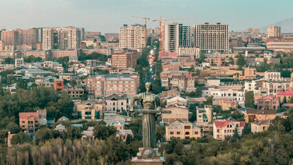 Aerial Drone Shot of Mother Armenia Statue Overlooking Yerevan Cityscape