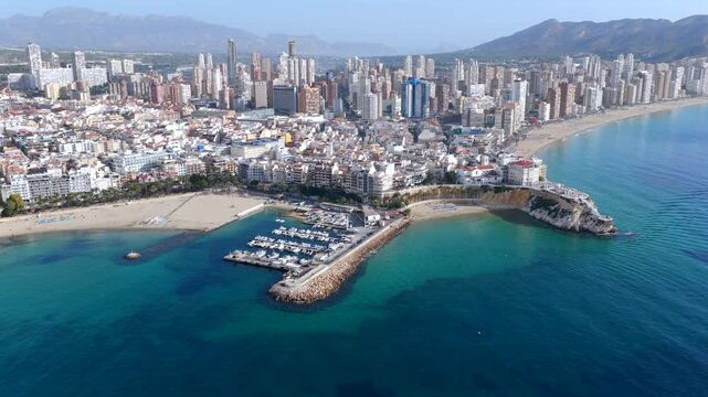 Dramatic Aerial Wide-Angle View: Benidorm's High-Rise Skyline, Beaches, and Hotels Towering Over the Mediterranean Sea, Spain