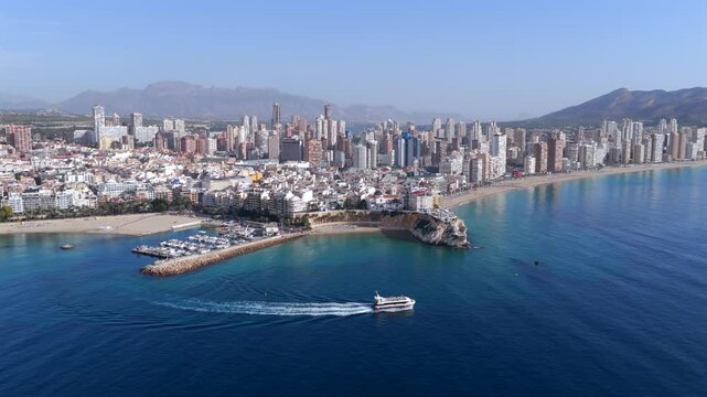 Dramatic Aerial Wide-Angle View: Benidorm's High-Rise Skyline, Beaches, and Hotels Towering Over the Mediterranean Sea, Spain