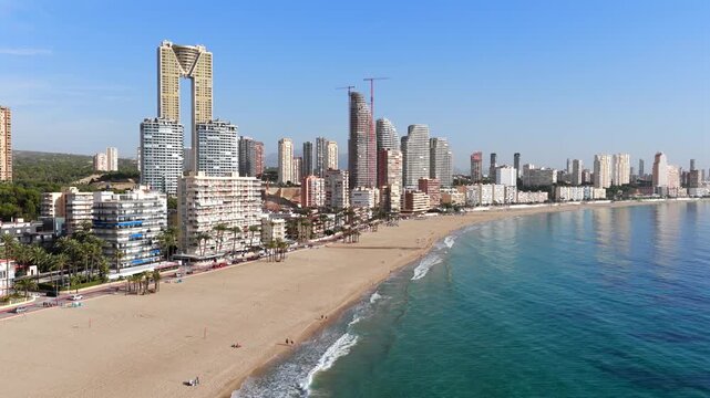 Dramatic Aerial Wide-Angle View: Benidorm's High-Rise Skyline, Beaches, and Hotels Towering Over the Mediterranean Sea, Spain