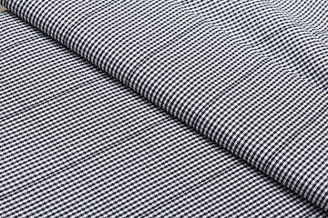 Draped cotton suiting fabric in a small black and white Pepita check (micro-houndstooth)....
