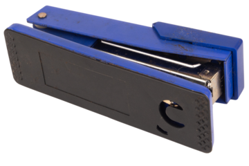 Dirty old stapler on white background