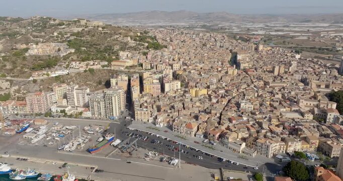 Aerial view of the historic center of Licata, located in the province of Agrigento, Sicily, Italy. It is a small town overlooking the Mediterranean Sea.