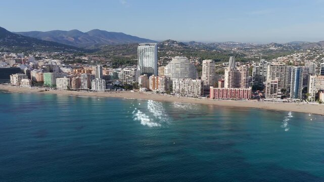 Aerial View of Calp, Spain and the Extensive Condos, Villas, and Prime Real Estate by the Majestic Pe&ntilde;&oacute;n de Ifach on the Mediterranean Coast