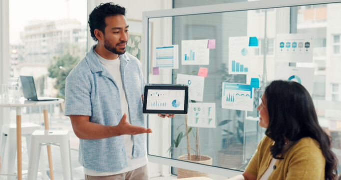 Planning, meeting and man with team on tablet for graph, kpi research or data analysis. Presentation, digital agency and workers on tech with charts, documents or statistics for seo report on screen - Powered by Adobe